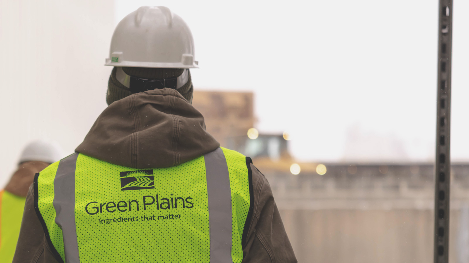 A Green Plains employee in high visibility gear
